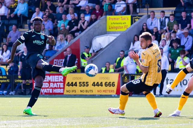 Hibs' Nohan Kenneh has a shot at goal during the match against Livingston.