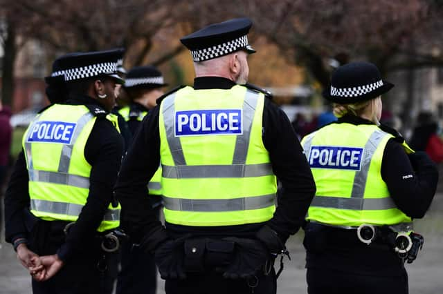 A large police presence was seen in Glasgow city centre after a gun and ammunition were found in a car on Sauchiehall Street. PIC: John Devlin.