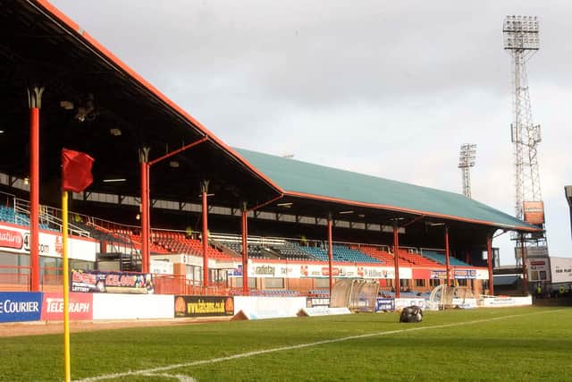 The main stand at Dens Park recently celebrated its centenary - it is one of only ten surviving Archibald Leitch-designed stands in Britain.