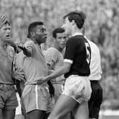 Brazil's Pele (centre) remonstrates with Scotland's Ronnie MacKinnon (right) following a clash with Billy Bremner (left background) during a friendly at Hampden, June 25, 1966.