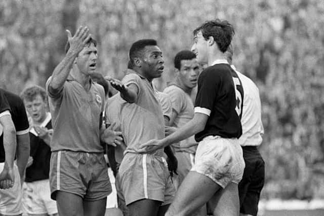 Brazil's Pele (centre) remonstrates with Scotland's Ronnie MacKinnon (right) following a clash with Billy Bremner (left background) during a friendly at Hampden, June 25, 1966.