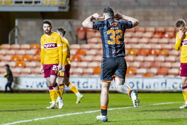 Dundee United's Tony Watt celebrates making it 2-0. (Photo by Roddy Scott / SNS Group)