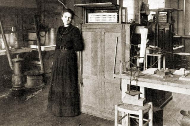 Marie Curie, pioneer in the fields of radiation, radioactivity and radiology, working in her laboratory at the Sorbonne in Paris in 1898 (Picture: Culture Club/Getty Images)