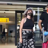 Passengers Guy arriving at Terminal 2 at Heathrow Airport in London.