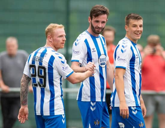 Jason Naismith (centre) celebrates his goal against East Kilbride with Kilmarnock team-mates Chris Burke (left) and Brad Lyons (right). (Photo by Mark Scates / SNS Group)