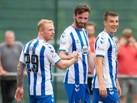 Jason Naismith (centre) celebrates his goal against East Kilbride with Kilmarnock team-mates Chris Burke (left) and Brad Lyons (right). (Photo by Mark Scates / SNS Group)