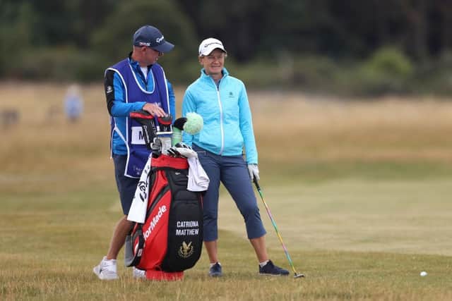 Catriona Matthew and her husband and caddie Graeme talk over a shot in the AIG Women's Open Por-Am at Muirfield. Picture: Charlie Crowhurst/Getty Images.