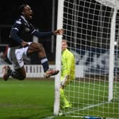 Striker Zach Robinson celebrates putting Dundee 2-0 up at Dens Park.