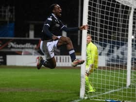 Striker Zach Robinson celebrates putting Dundee 2-0 up at Dens Park.