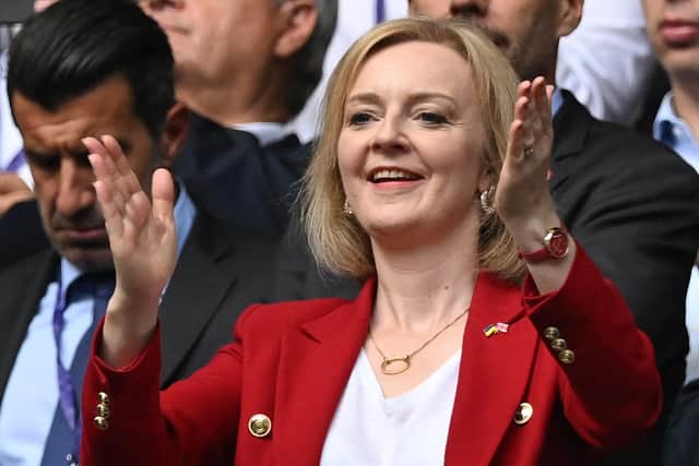 Foreign secretary Liz Truss cheers prior to the UEFA Women's Euro 2022 final football match between England and Germany at Wembley Stadium. Picture: Justin Tallis/AFP via Getty Images
