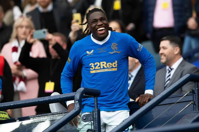 Rangers defender Calvin Bassey is all smiles after picking up his Scottish Cup winners' medal following the 2-0 victory over Hearts at Hampden. (Photo by Sammy Turner / SNS Group)