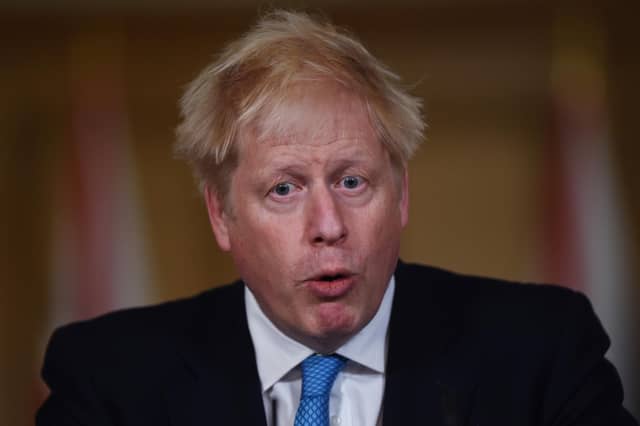 Britain's Prime Minister Boris Johnson speaks during a virtual press conference