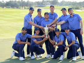 Francesco Molinari celebrates with his Continent of Europe team after their win in the inaugural Hero Cup at Abu Dhabi Golf Club. Picture: David Cannon/Getty Images.