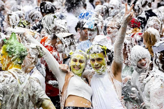 University students take part in The annual Raisin Monday foam fight at the University of St Andrews (Photo: Lisa Ferguson).