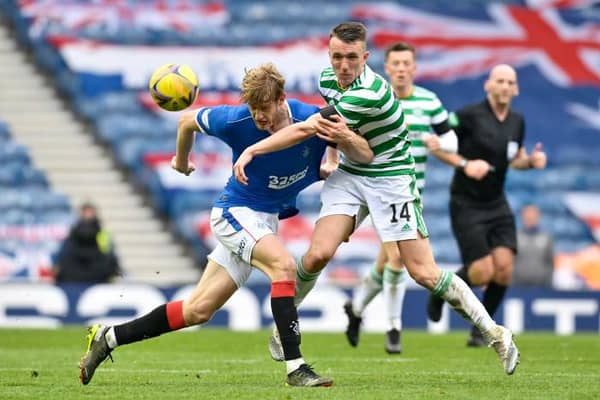 Rangers' Filip Helander (left) tussles with Celtic's David Turnbull during a Scottish Cup tie between Rangers and Celtic at Ibrox Stadium, on April 18, 2021, in Glasgow, Scotland. (Photo by Rob Casey / SNS Group)