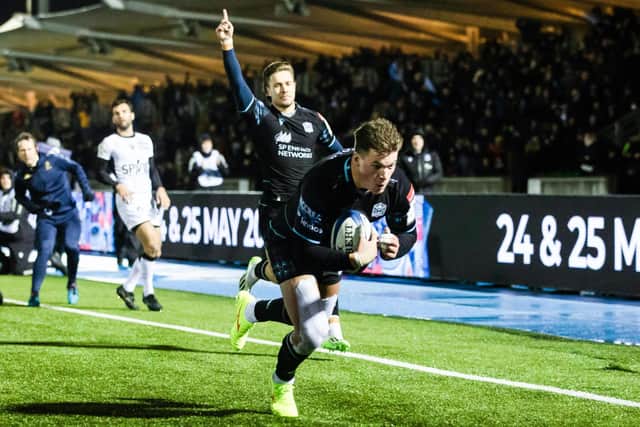 Glasgow Warriors' Huw Jones scores a try during the win over Toulon.