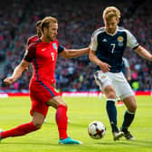 England's Harry Kane takes on Stuart Armstrong during the 2-2 draw at Hampden in 2017, the last time the two nations met. Picture: SNS