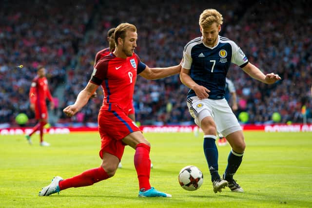 England's Harry Kane takes on Stuart Armstrong during the 2-2 draw at Hampden in 2017, the last time the two nations met. Picture: SNS