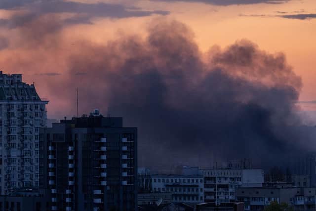 Smoke rises after Russian missiles hit Kyiv on Thursday (Picture: John Moore/Getty Images)
