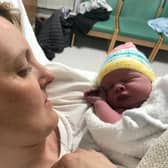 Jayne Leck, 36, went into labour with baby Aria Grace - and her partner Francie Quinn, 46, helped to deliver the tot in the back of a cab. (SWNS)