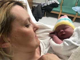 Jayne Leck, 36, went into labour with baby Aria Grace - and her partner Francie Quinn, 46, helped to deliver the tot in the back of a cab. (SWNS)
