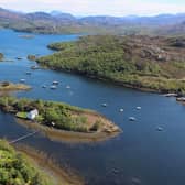 The Dry Island is situated in the Gair Loch, surrounded by incredible Scottish scenery.