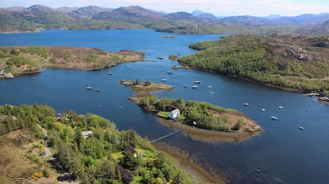 The Dry Island is situated in the Gair Loch, surrounded by incredible Scottish scenery.