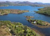 The Dry Island is situated in the Gair Loch, surrounded by incredible Scottish scenery.