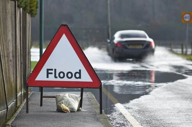 Flooding and heavy rain creates extra hazards for drivers