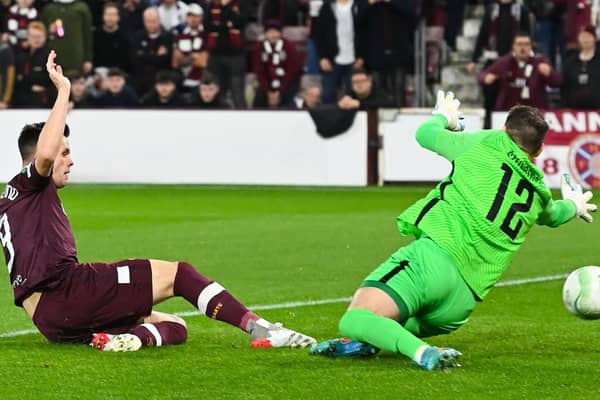 Hearts' Lawrence Shankland puts Hearts 1-0 against RFS at Tynecastle.