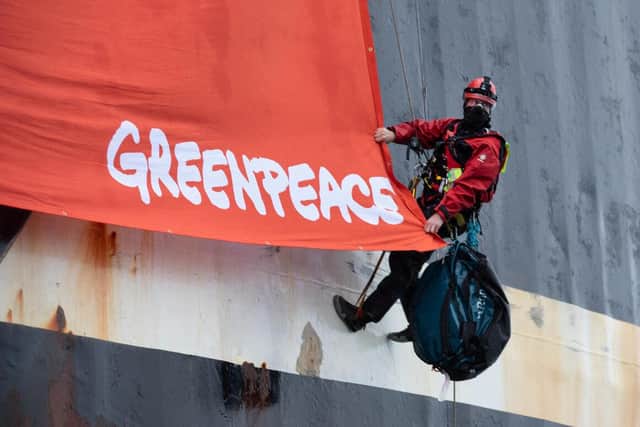 Campaigners boarded the giant ship, which was fishing legally, in a protest against the UK's failure to properly protect the marine environment