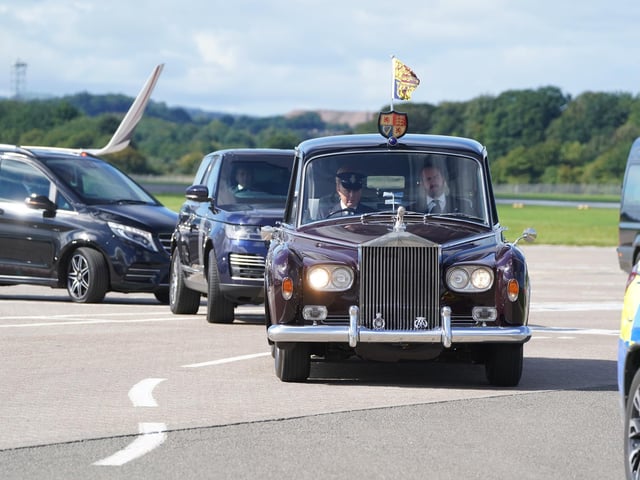 The motorcade carrying King Charles III and the Queen Consort leaves Edinburgh Airport after Charles and Camilla travelled from London, ahead of joining the procession of Queen Elizabeth's coffin from the Palace of Holyroodhouse to St Giles' Cathedral, Edinburgh. Picture date: Monday September 12, 2022.