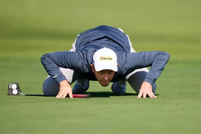 Stuart Manley gets down low to line up a putt during the final round of the Rolex Challenge Tour Grand Final supported by The R&A at Club de Golf Alcanada. Picture: Angel Martinez/Getty Images.