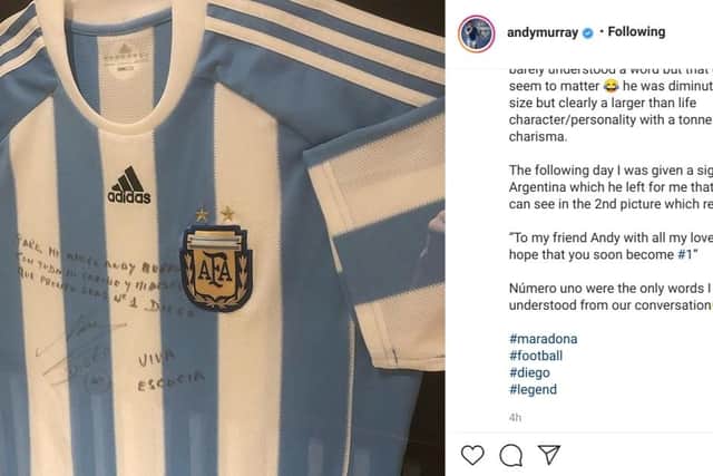 Murray shows off the Argentinian shirt the football icon gave to him before going on to become tennis world number one.