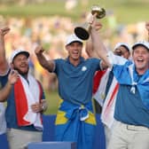 Bob MacIntyre lifts the Ryder Cup after being unbeaten on his debut for Europe at Marco Simone Golf Club in Rome. Picture: Patrick Smith/Getty Images.