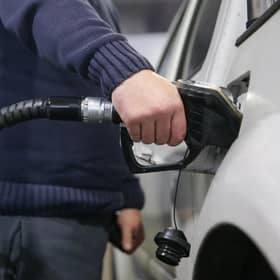 Use free comparison apps to find the best deals on petrol near you (Picture: Daniel Leal/AFP via Getty Images)