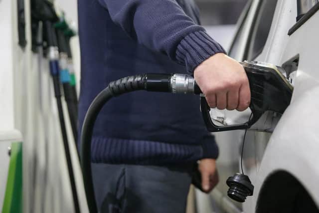 Use free comparison apps to find the best deals on petrol near you (Picture: Daniel Leal/AFP via Getty Images)