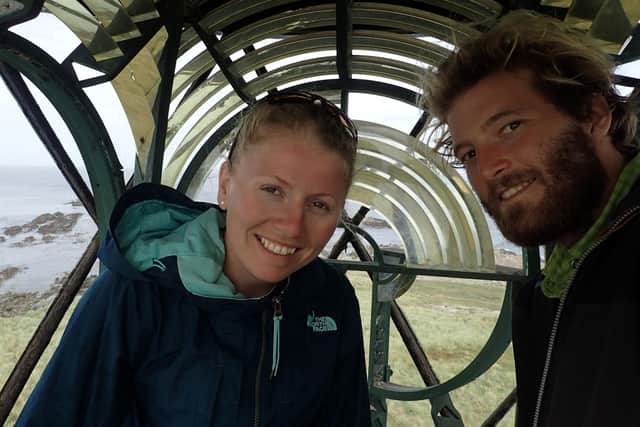Edd and Charly in a lighthouse on their camping trip to the Falklands before the hurricane struck