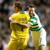 Hero keeper Artur Boruc is congratulated by Celtic team-mate and countryman Maciej Zurawski (right) in August 2007.