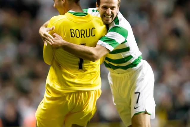 Hero keeper Artur Boruc is congratulated by Celtic team-mate and countryman Maciej Zurawski (right) in August 2007.