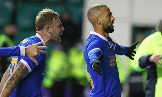 Kemar Roofe (right) celebrates with Scott Arfield after scoring the late winner for Rangers against Hibs at Easter Road. (Photo by Craig Williamson / SNS Group)