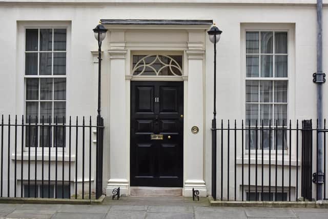 The front door of 11 Downing Street, the official residence of the Chancellor of the Exchequer.