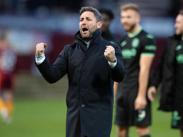 Hibs manager Lee Johnson celebrates at full time after the 3-2 win against Motherwell.