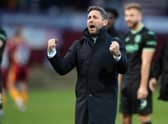 Hibs manager Lee Johnson celebrates at full time after the 3-2 win against Motherwell.