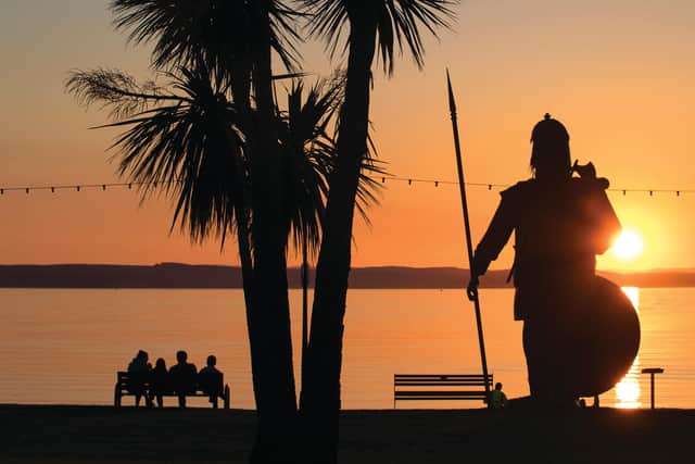 Giant Viking statue known locally as Magnus, standing tall in Largs at sunset. Picture: Kenny Lam