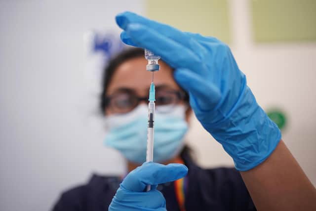 A nurse prepares a dose of the Pfizer COVID-19 vaccination. Picture: PA