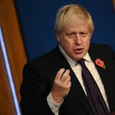 Prime Minister Boris Johnson spoke during a press conference inside the Downing Street Briefing Room on November 14. His conference came after fourteen days of gritty negotiations by 20,000 diplomats from nearly 200 countries and the hopes of salvaging a deal at COP26 boiled down to cash, coal, compensation and the willingness to speed up the drawdown of fossil fuels.