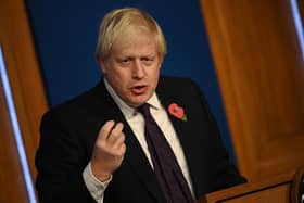 Prime Minister Boris Johnson spoke during a press conference inside the Downing Street Briefing Room on November 14. His conference came after fourteen days of gritty negotiations by 20,000 diplomats from nearly 200 countries and the hopes of salvaging a deal at COP26 boiled down to cash, coal, compensation and the willingness to speed up the drawdown of fossil fuels.