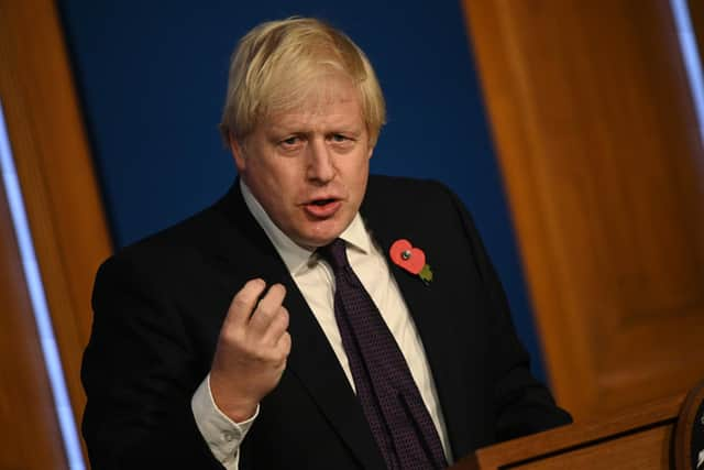 Prime Minister Boris Johnson spoke during a press conference inside the Downing Street Briefing Room on November 14. His conference came after fourteen days of gritty negotiations by 20,000 diplomats from nearly 200 countries and the hopes of salvaging a deal at COP26 boiled down to cash, coal, compensation and the willingness to speed up the drawdown of fossil fuels.