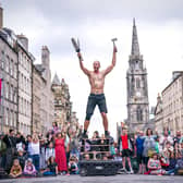 Circus street artist 'Reidiculous' performs for the Fringe crowds on the Royal Mile. Picture: Jane Barlow/PA Wire